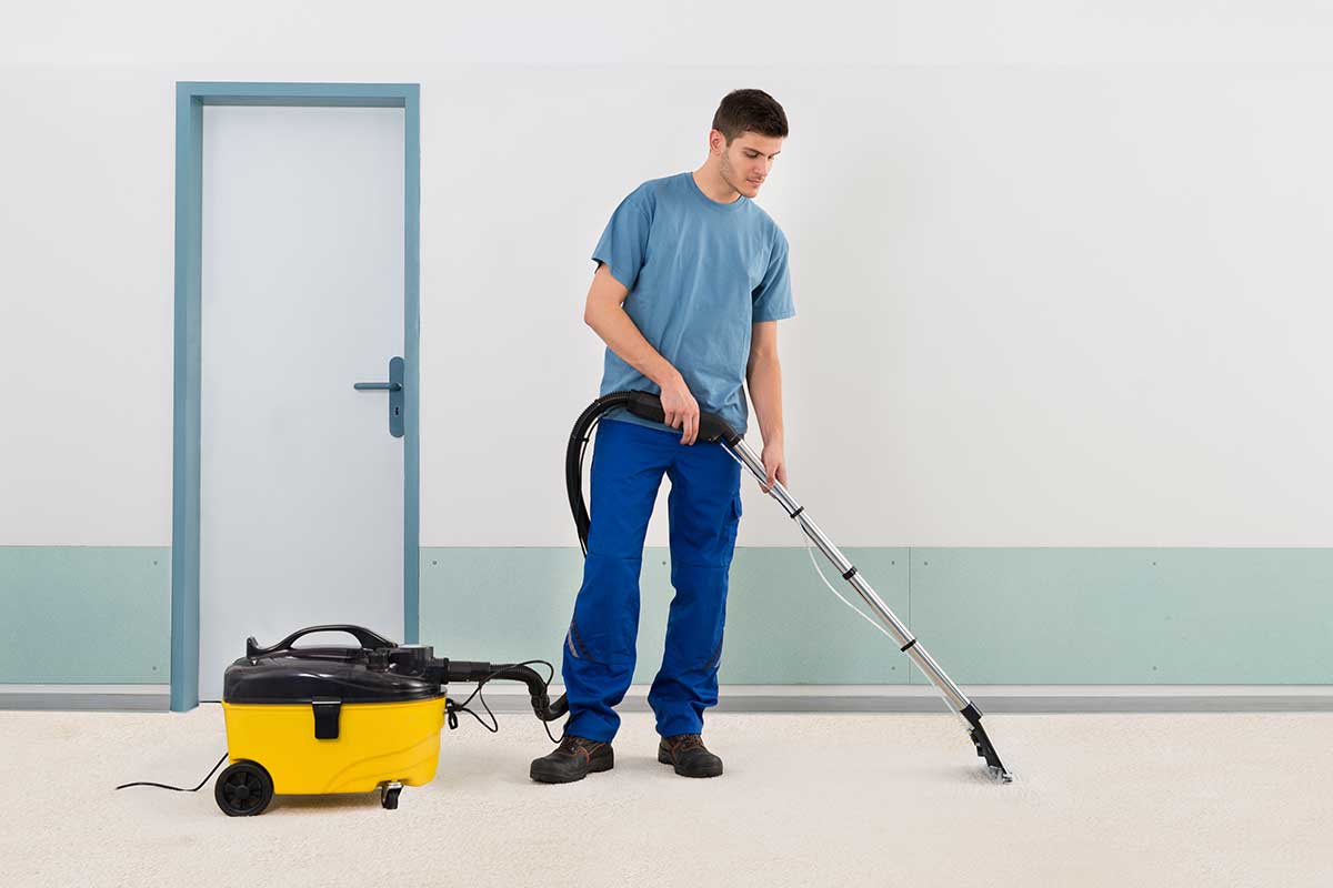 worker providing vacuuming for Commercial Carpet Cleaning in Prince George's County, MD